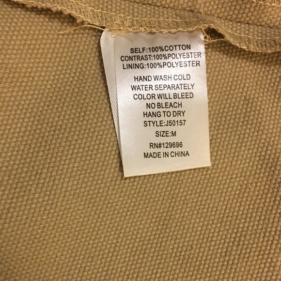 Tan jacket with chocolate leather sleeves. - Picture 5 of 8